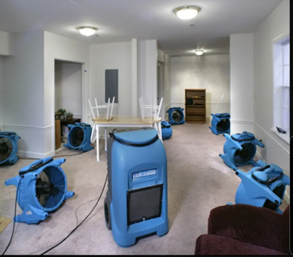 Air movers and dehumidifier setup for Water Damage Restoration in Parker